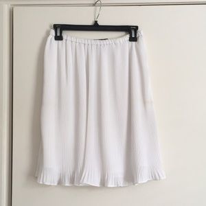 White pleated chiffon knee length skirt